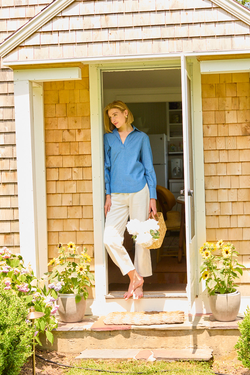Woman in denim tencel shirt
