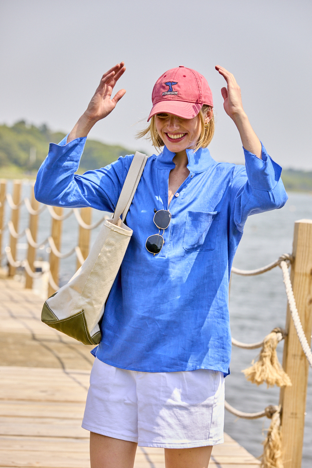 Woman wearing a blue linen tunic