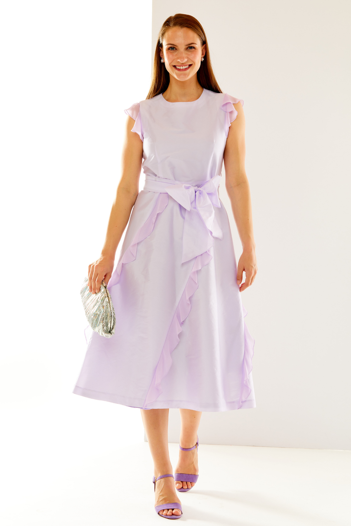 Woman in lilac taffeta dress