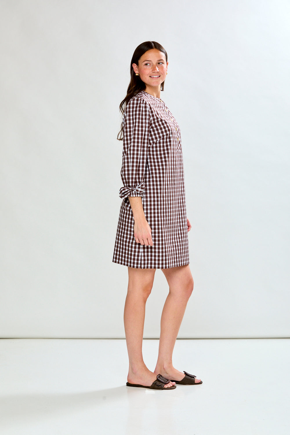 Woman in check dress