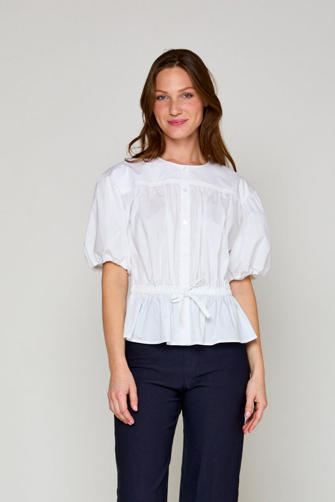 Woman in white blouse