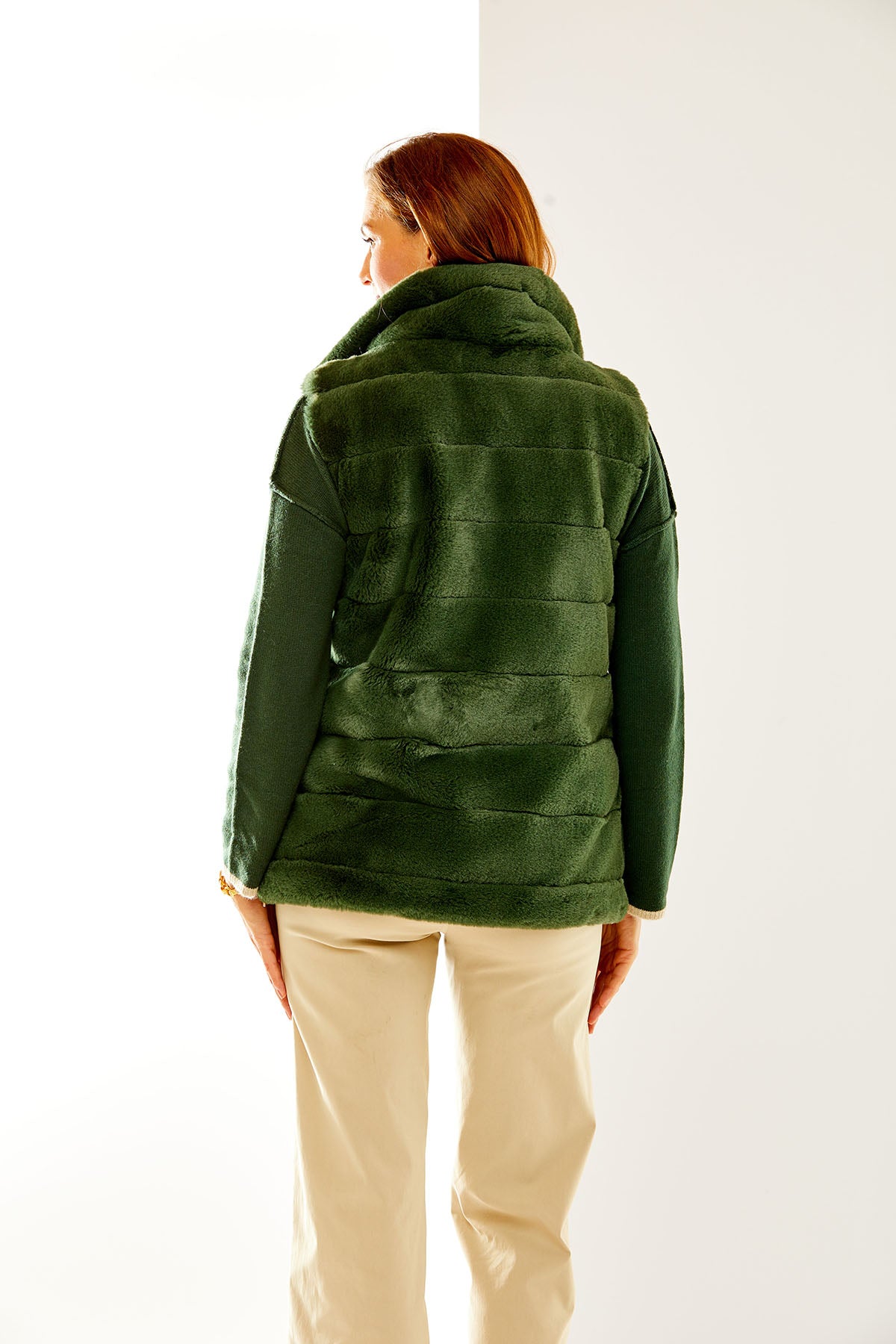 Woman in hunter green Lauren Vest