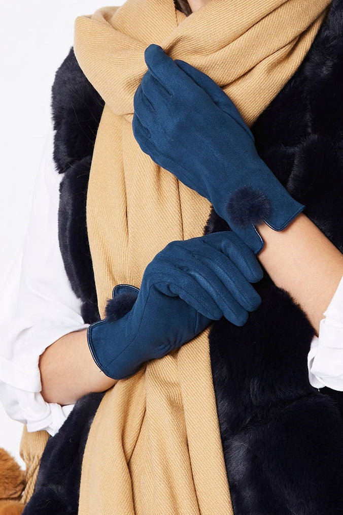 Woman in navy faux suede faux fur gloves