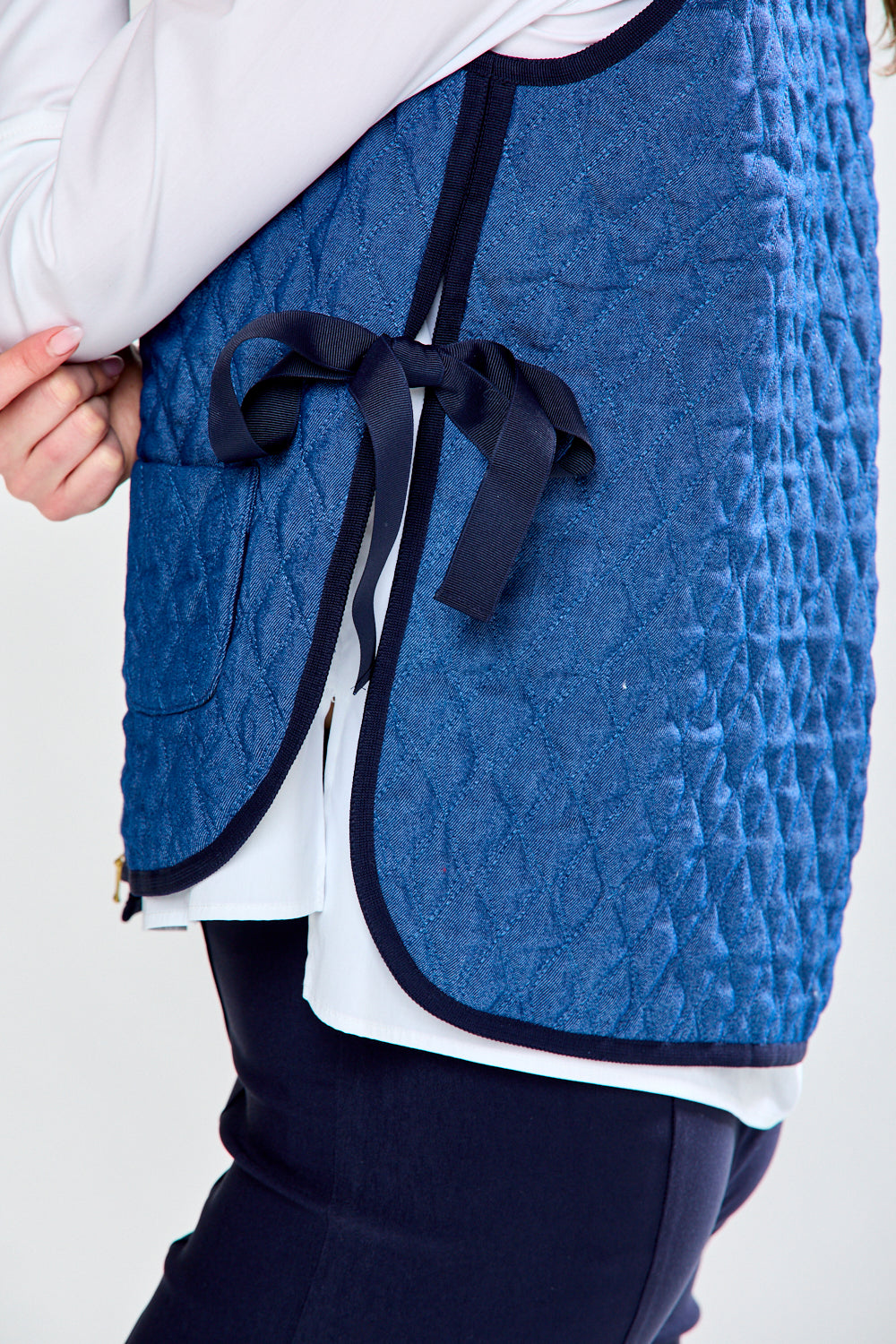 Woman in quilted vest