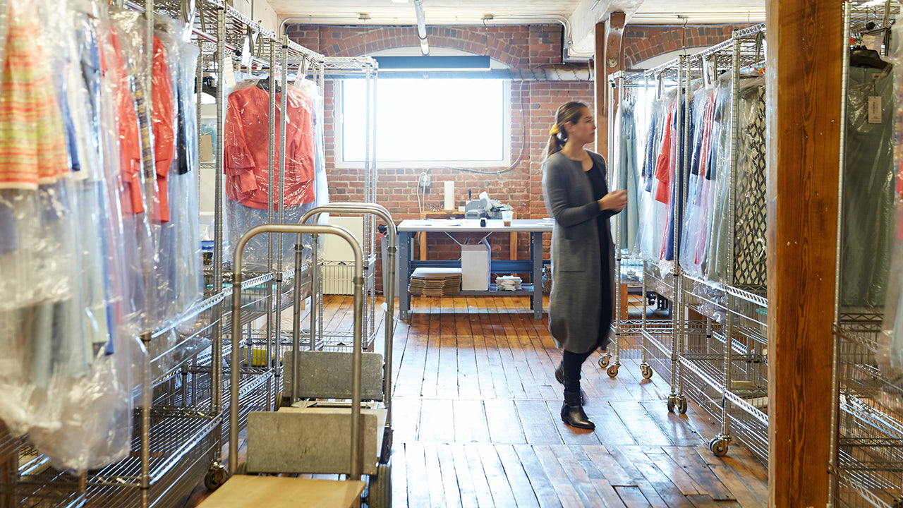 Woman walking through a warehouse
