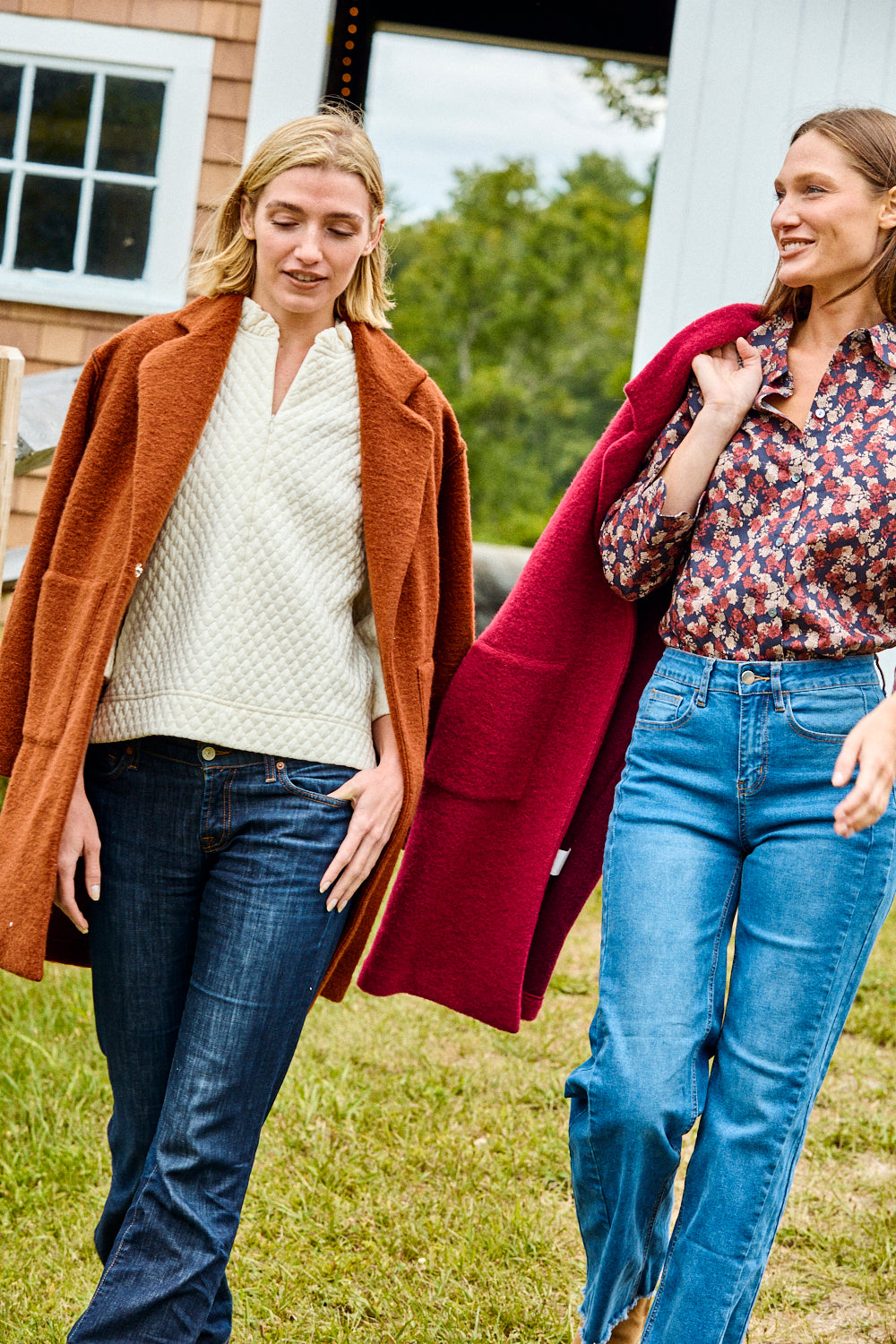 Woman wearing a textured white shirt and blue jeans