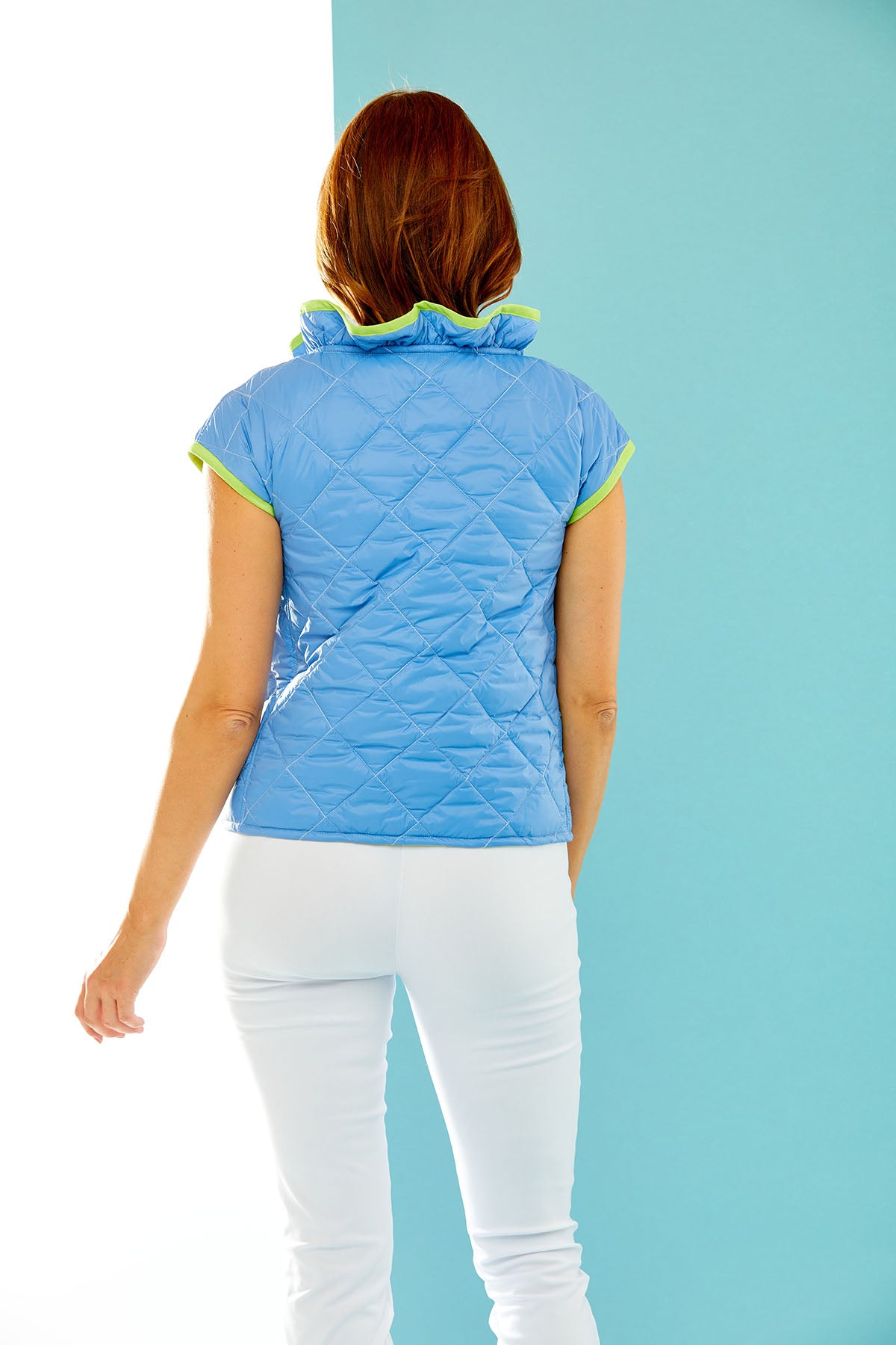 Woman in quilted vest