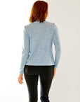 Woman in soft blue sweater
