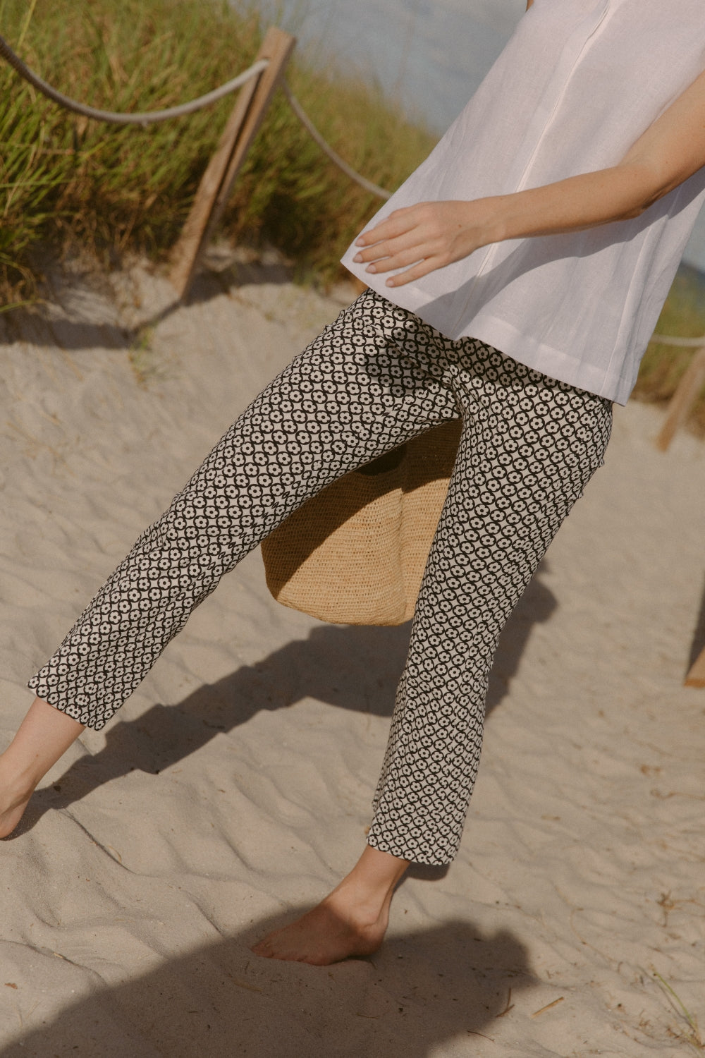 Woman in floral circle pants