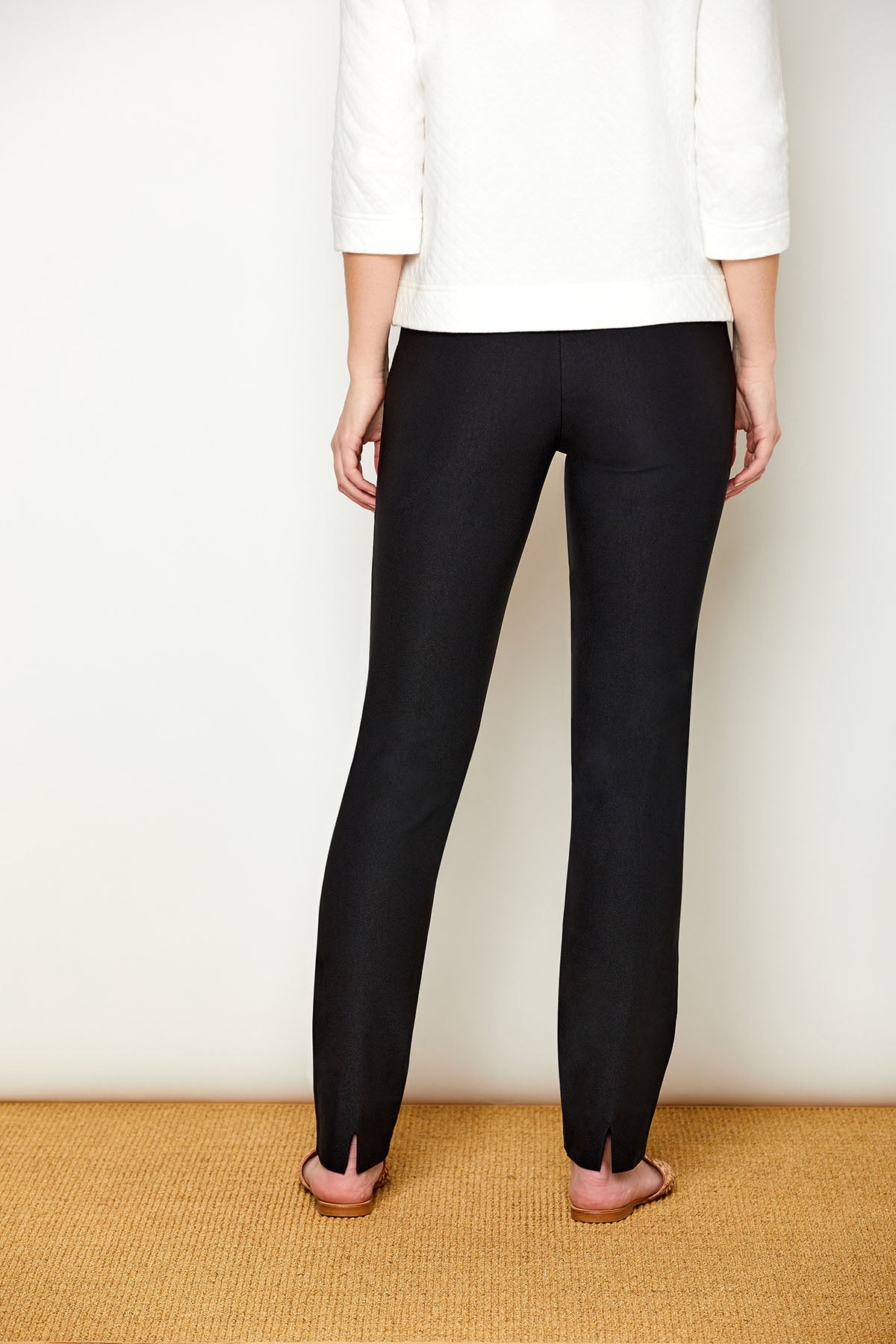 Woman in fitted long pants