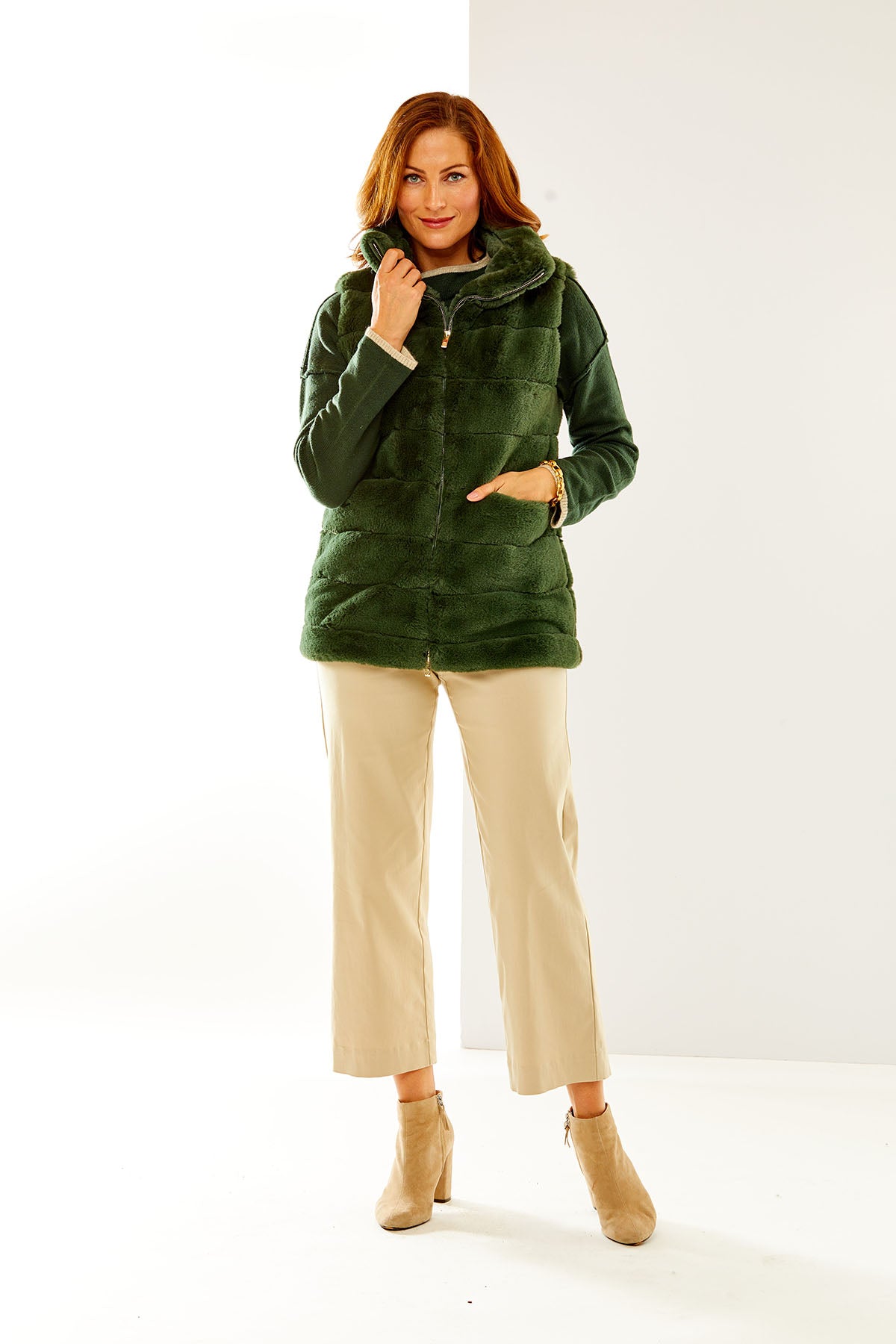 Woman in hunter green Lauren Vest