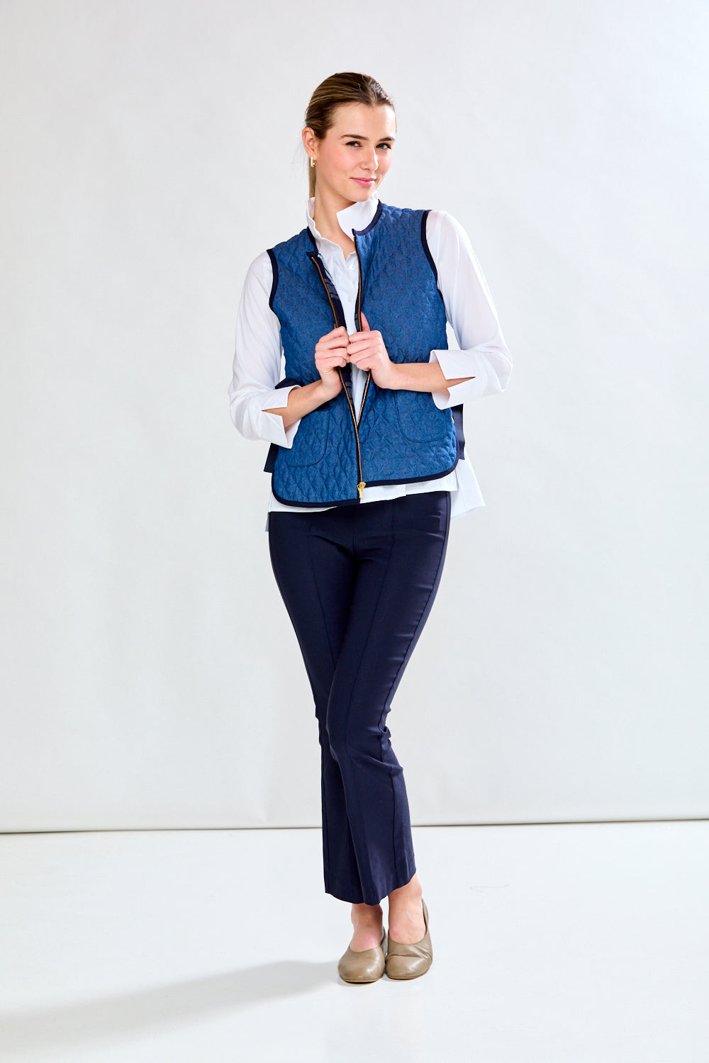 Woman in quilted vest