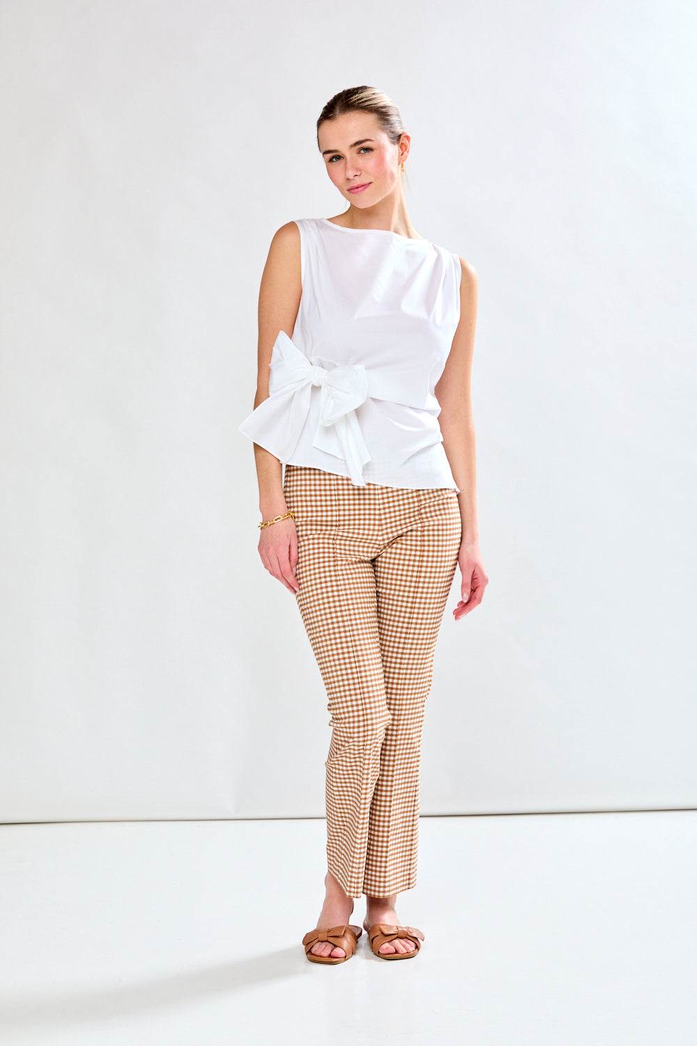 Woman in white cotton blouse