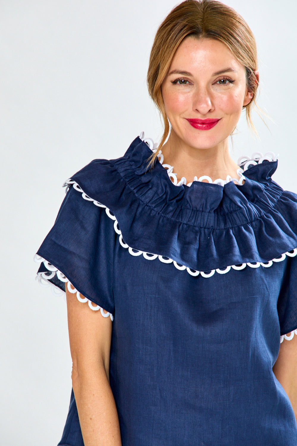 Woman in navy linen blouse
