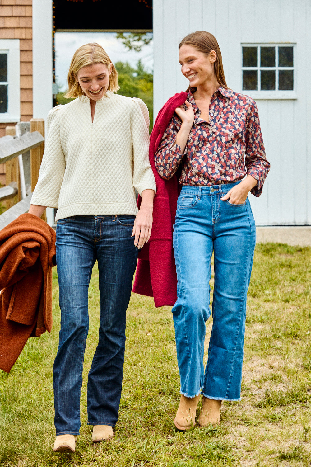 Woman wearing a textured white shirt and blue jeans