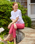 Woman in white top