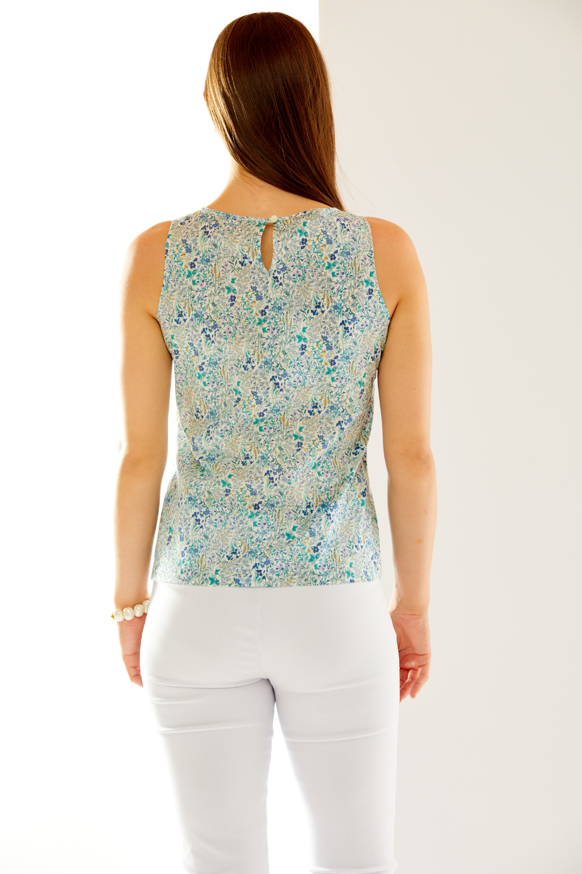 Woman in lilac floral top