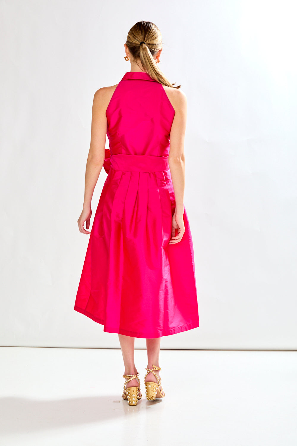 Woman in fuschia dress