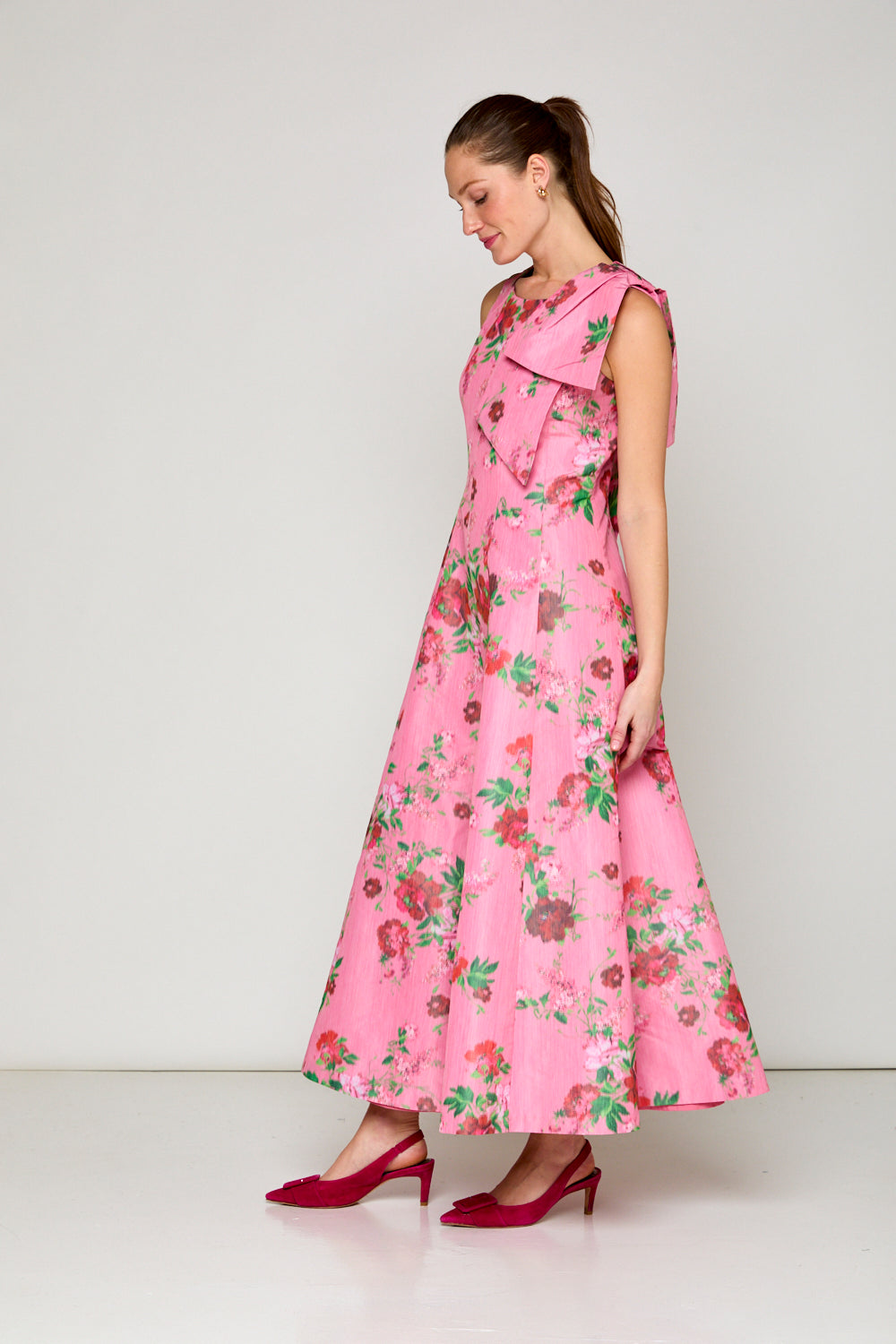 Woman in pink floral dress