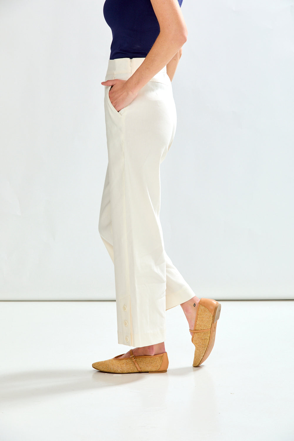 Woman in oyster pant