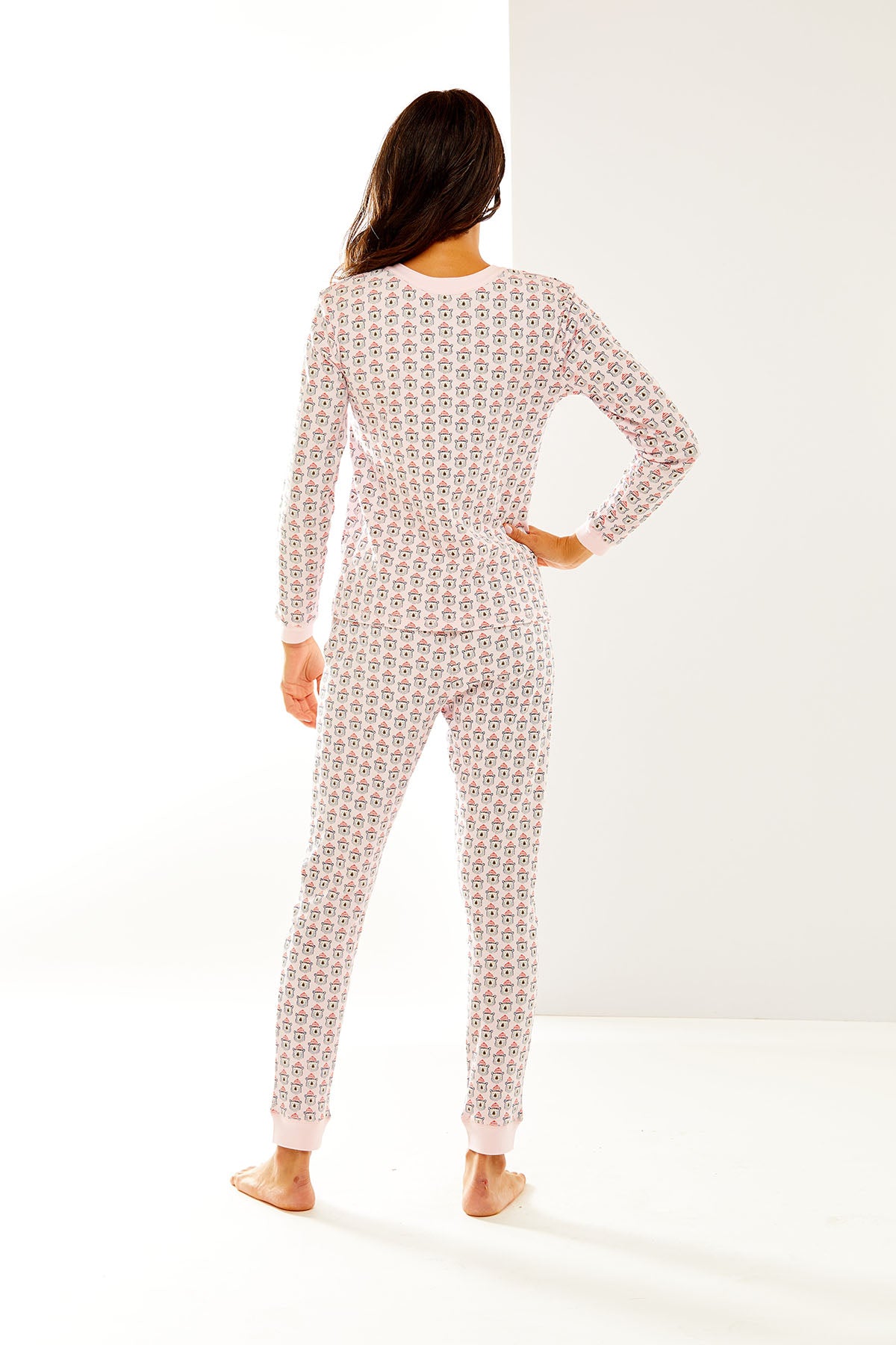 Woman in pippa polar bear pajamas