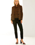 Woman in camel printed jacket