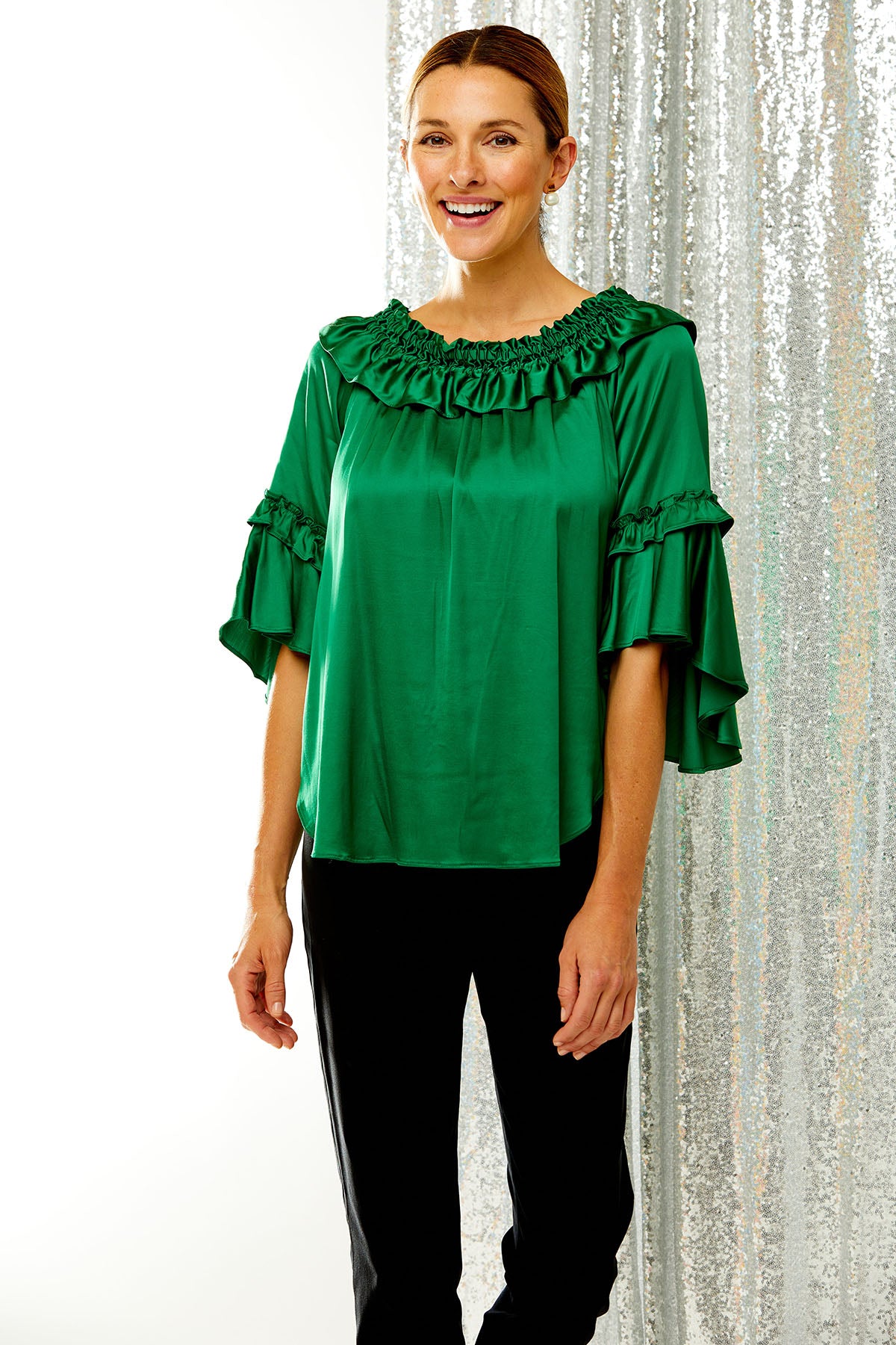 Woman in emerald blouse