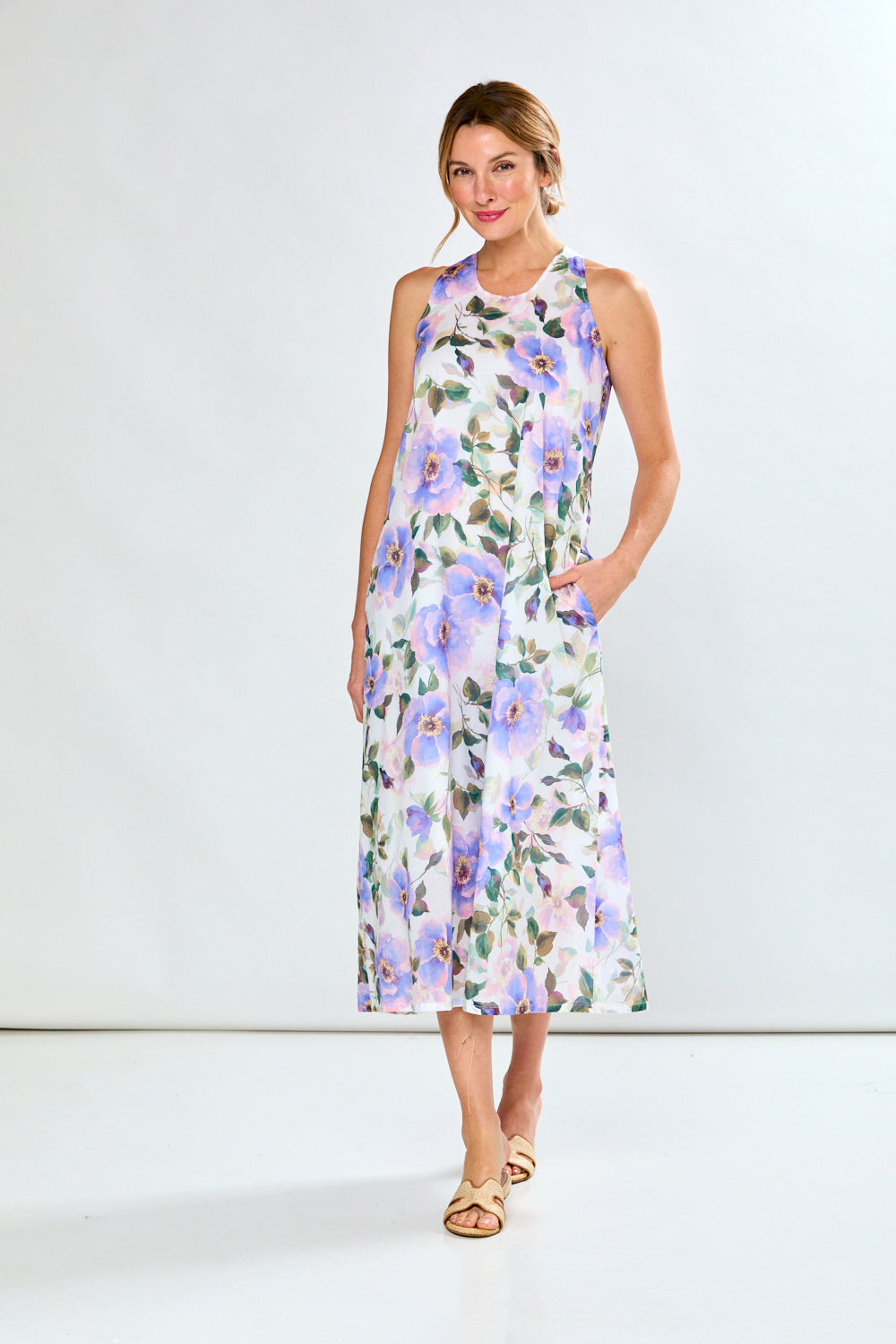 Woman in violet poppies dress