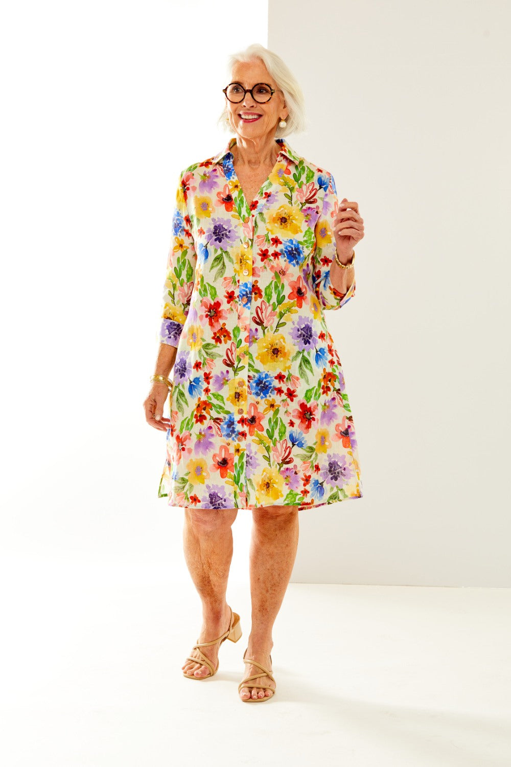 Woman in summer bouquet linen shirtdress