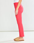 Person wearing Guava pants on a white background