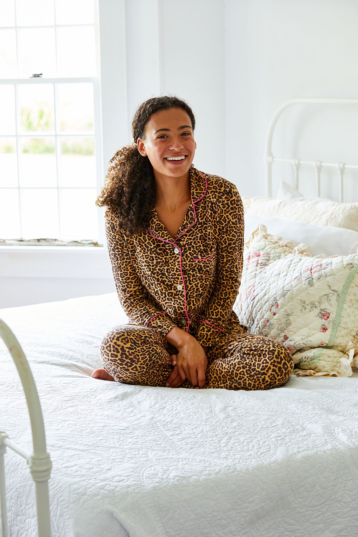Woman in cheetah print pajamas