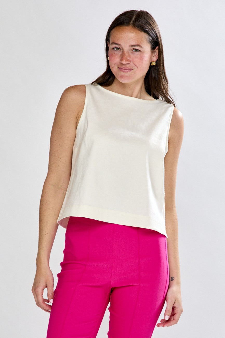 Woman in white top