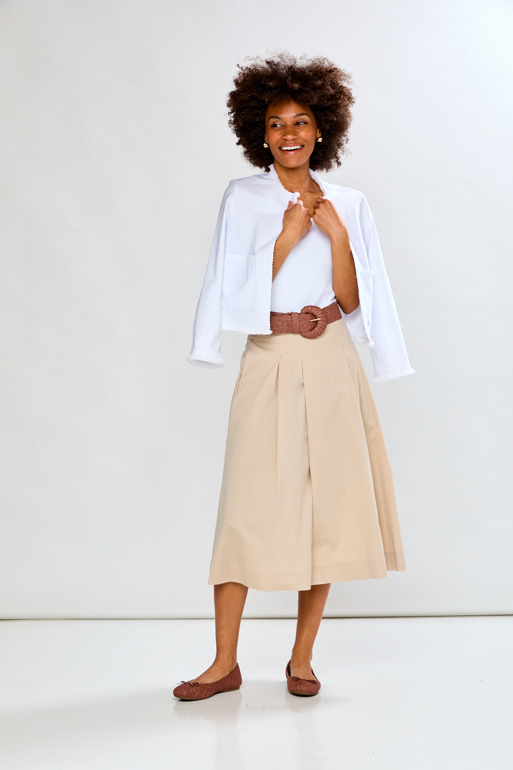 Woman in white fringe jacket
