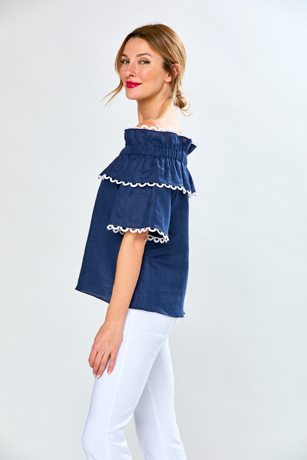 Woman in navy linen blouse