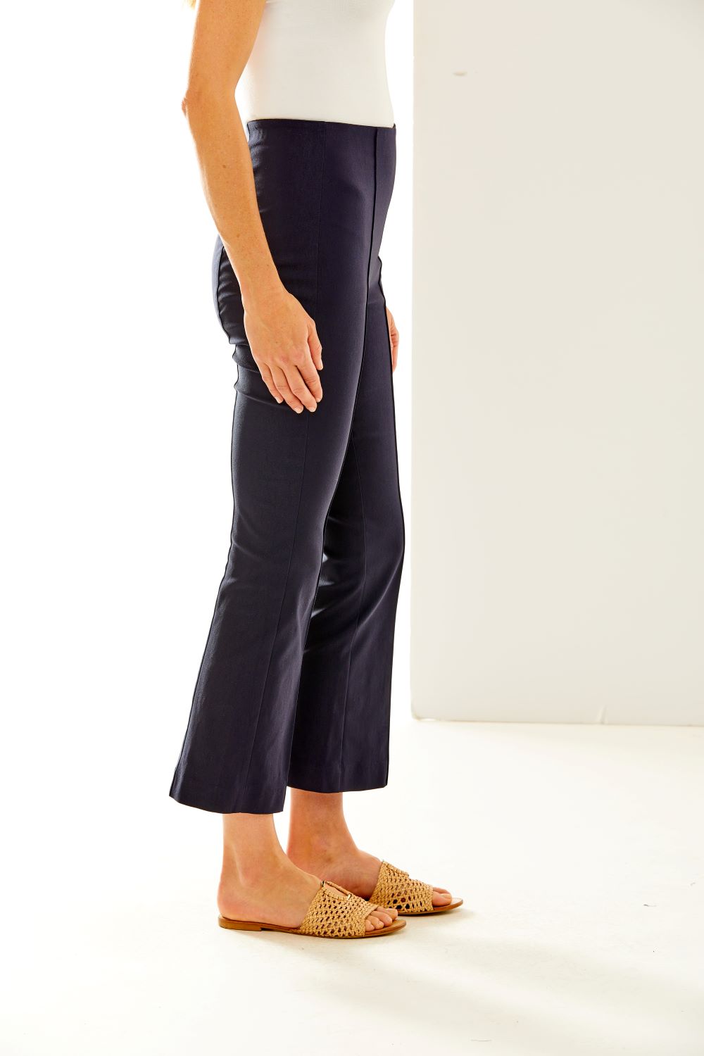 Woman wearing navy pants