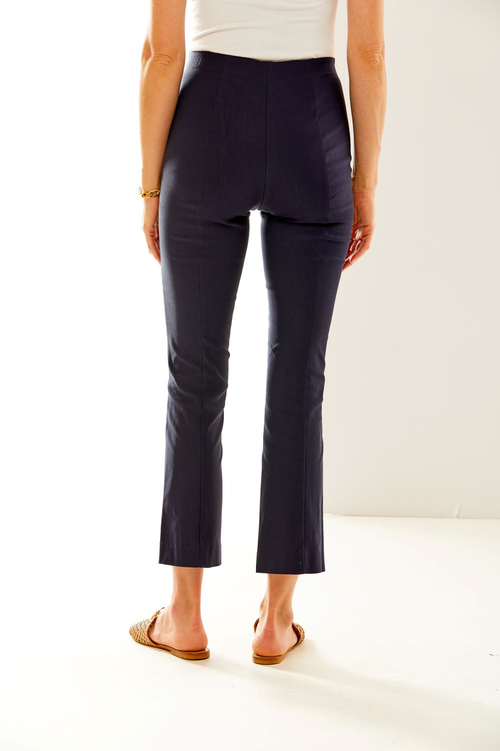 Woman wearing navy pants