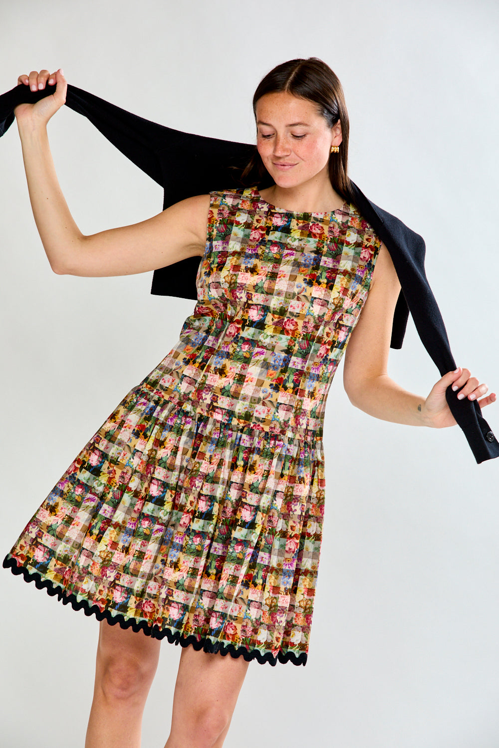 Woman in floral gingham dress