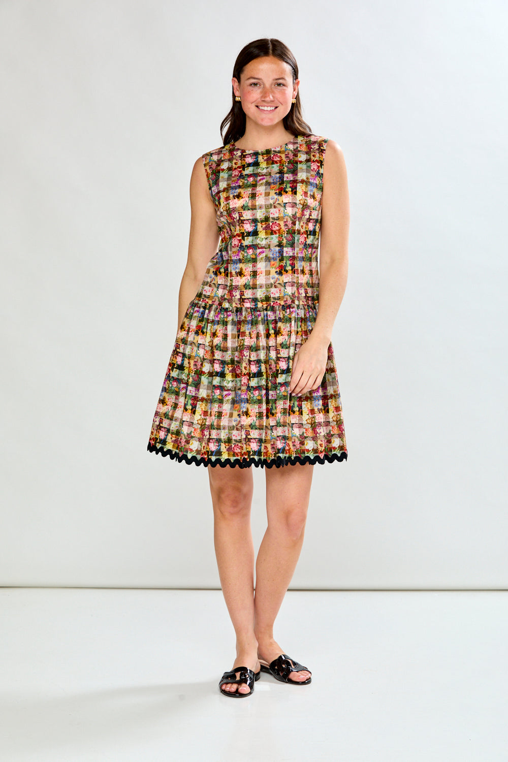 Woman in floral gingham dress