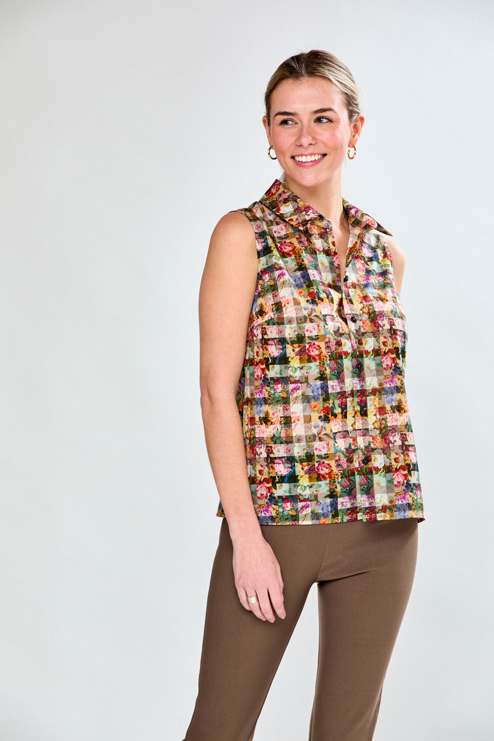 Woman in gingham floral top