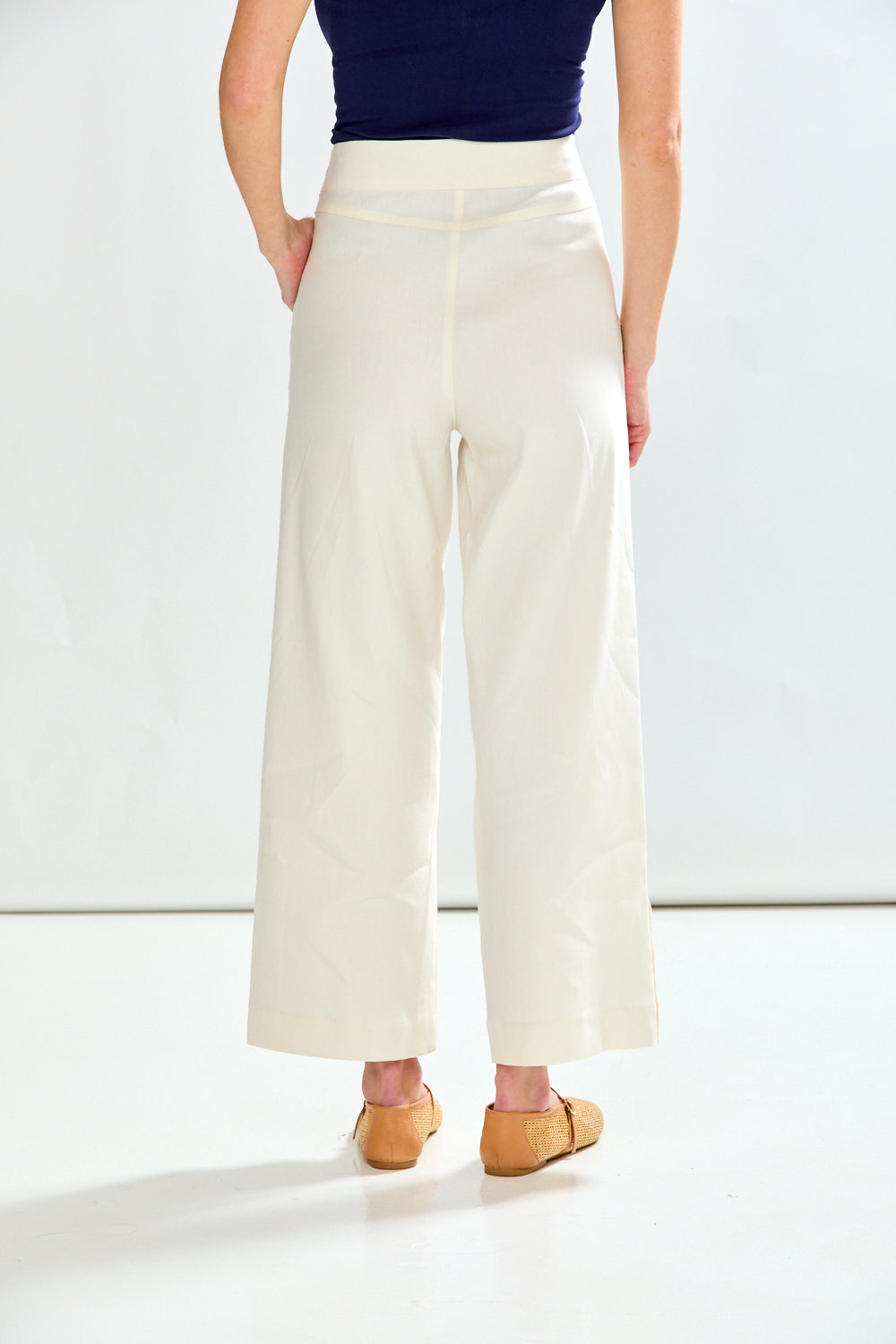 Woman in oyster pant