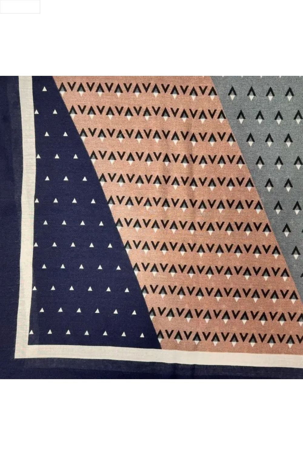 Multicolored patterned scarf on a white background