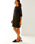 Woman in dress with faux leather