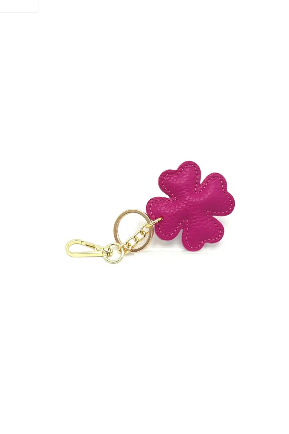 Fuchsia four-leaf clover keychain on a white background