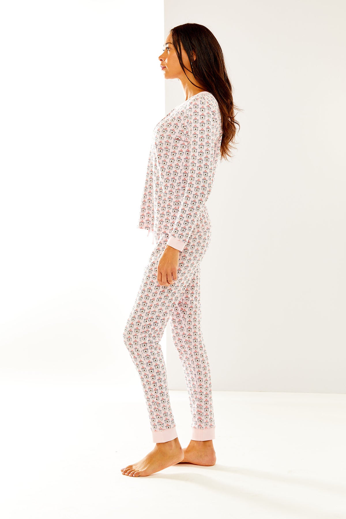 Woman in pippa polar bear pajamas