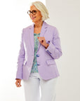 Woman in lavender jacket