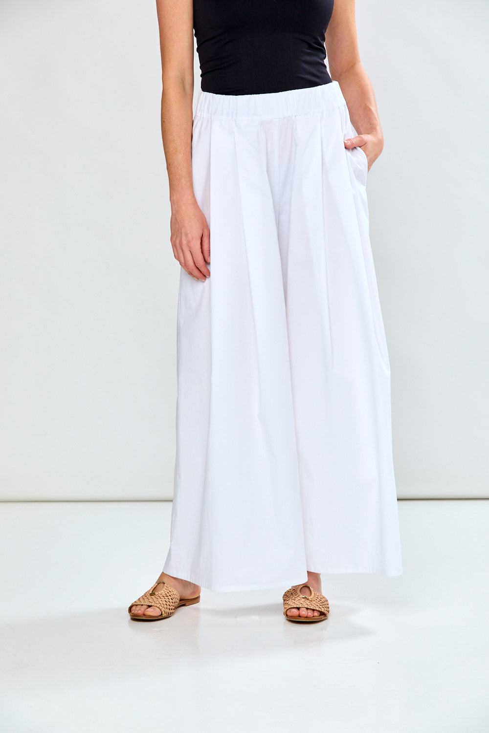 woman in white pants