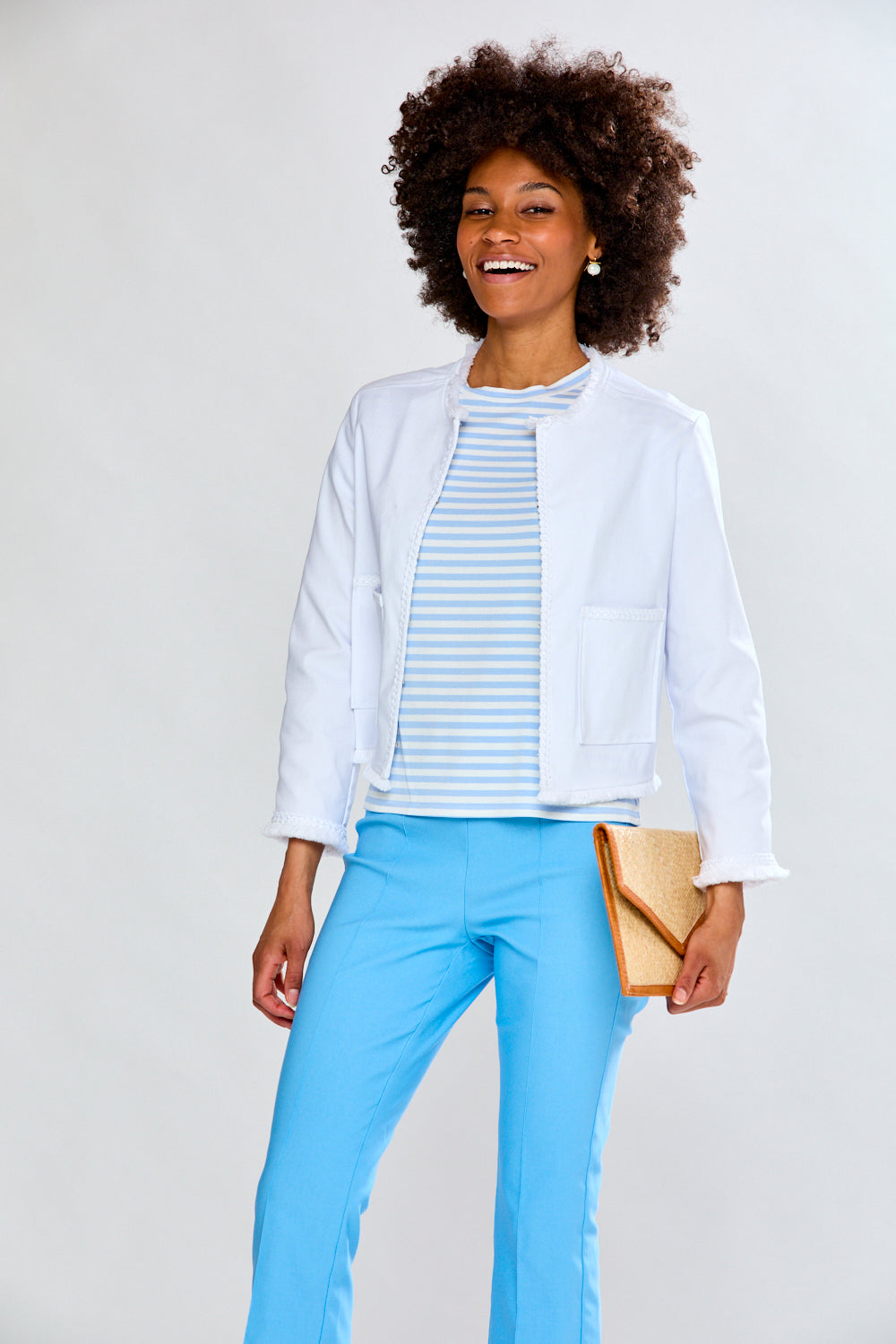 Woman in white fringe jacket