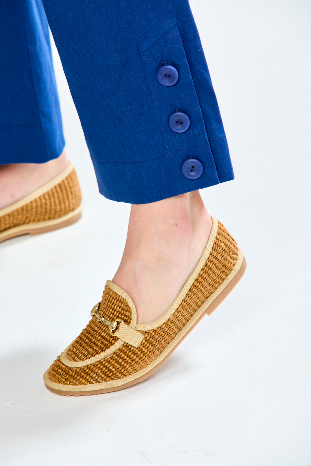 Woman in admiral blue pants