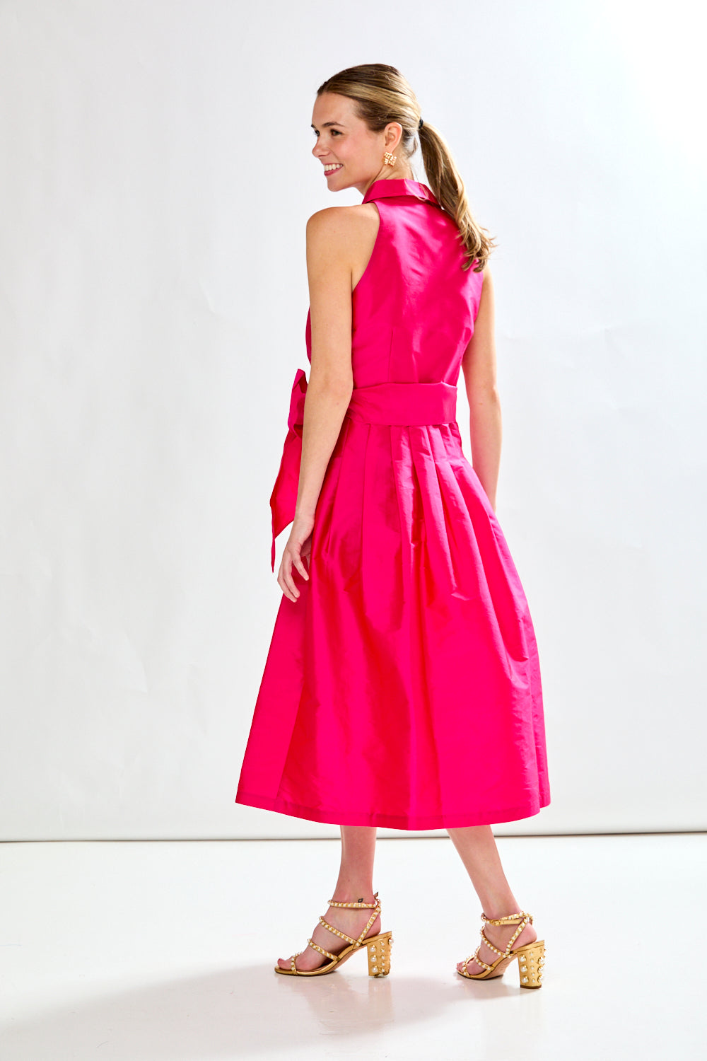 Woman in fuschia dress