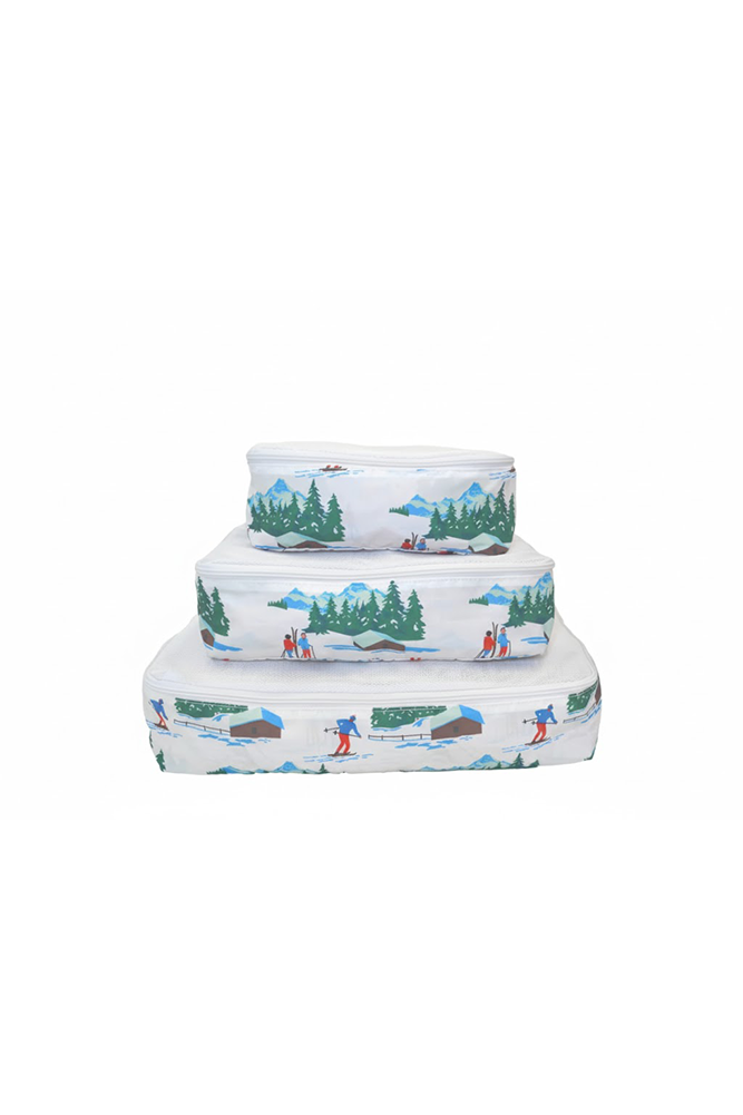 Set of three stacked boxes with nature-themed illustrations on a white background
